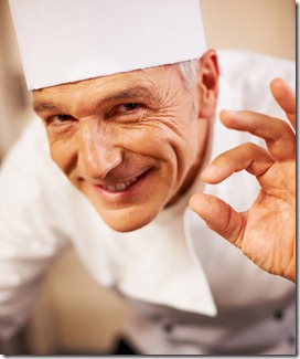 Smiling chef with positive gesture